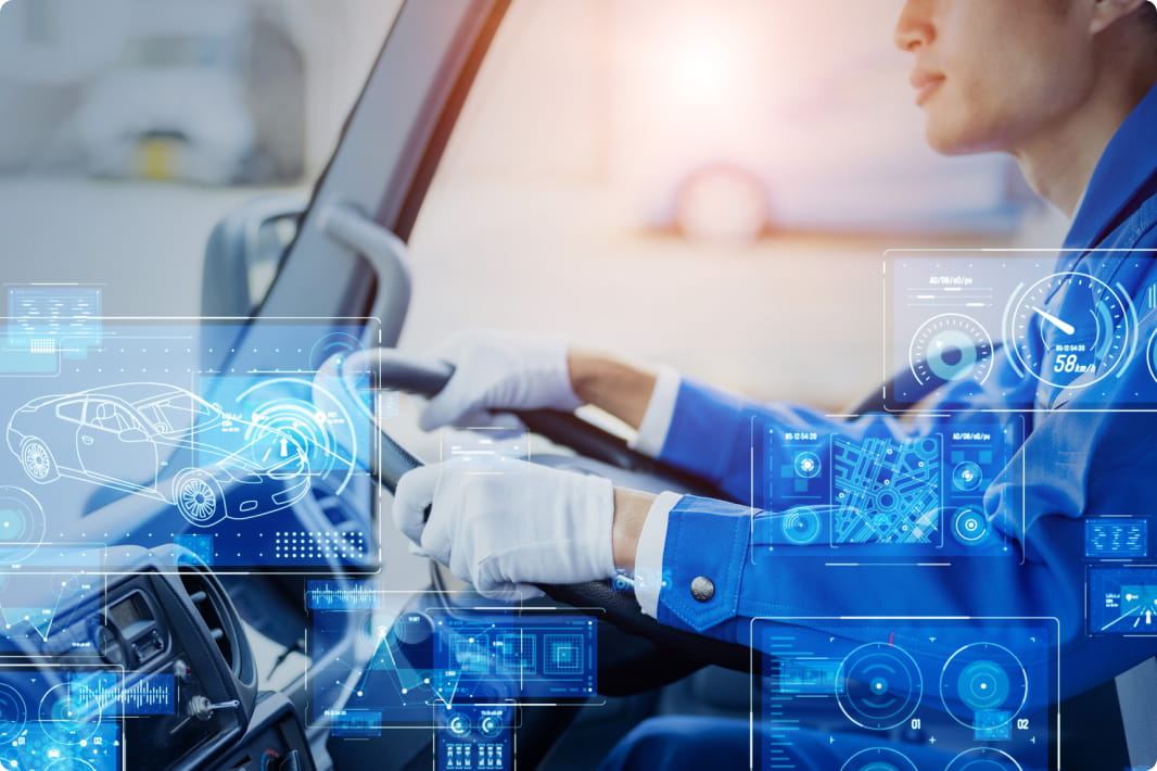 車内でハンドルを握るドライバー